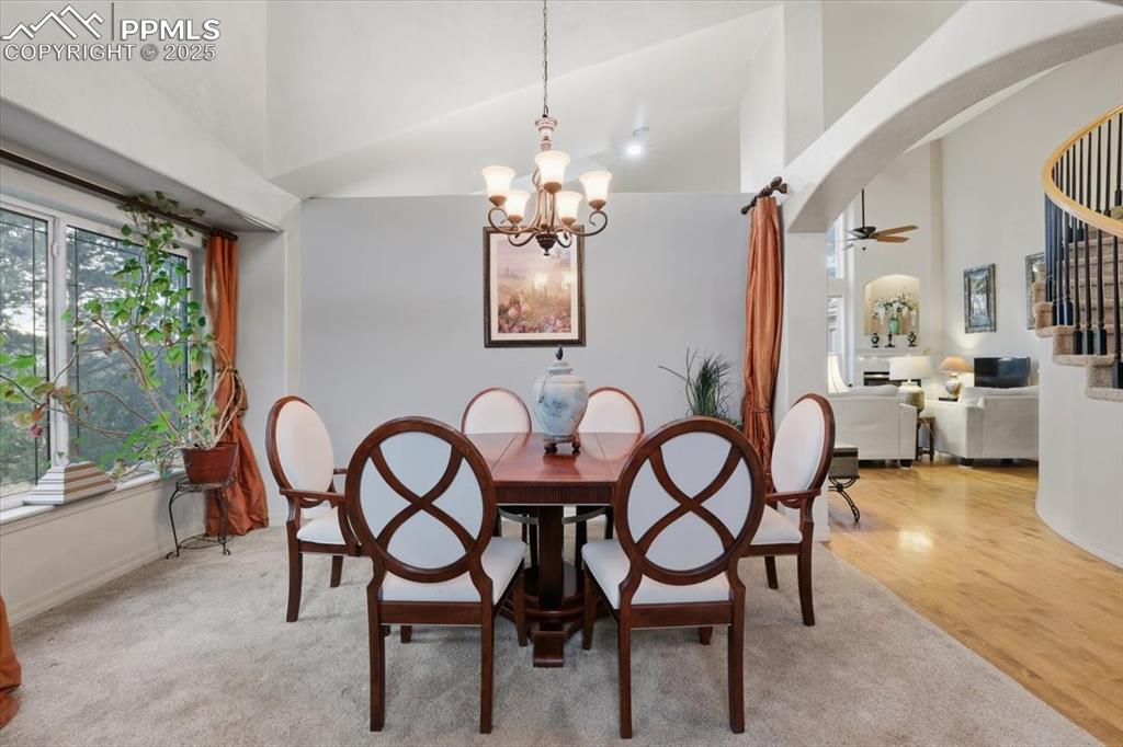 Image 4 of 49: Elegant formal dining room
