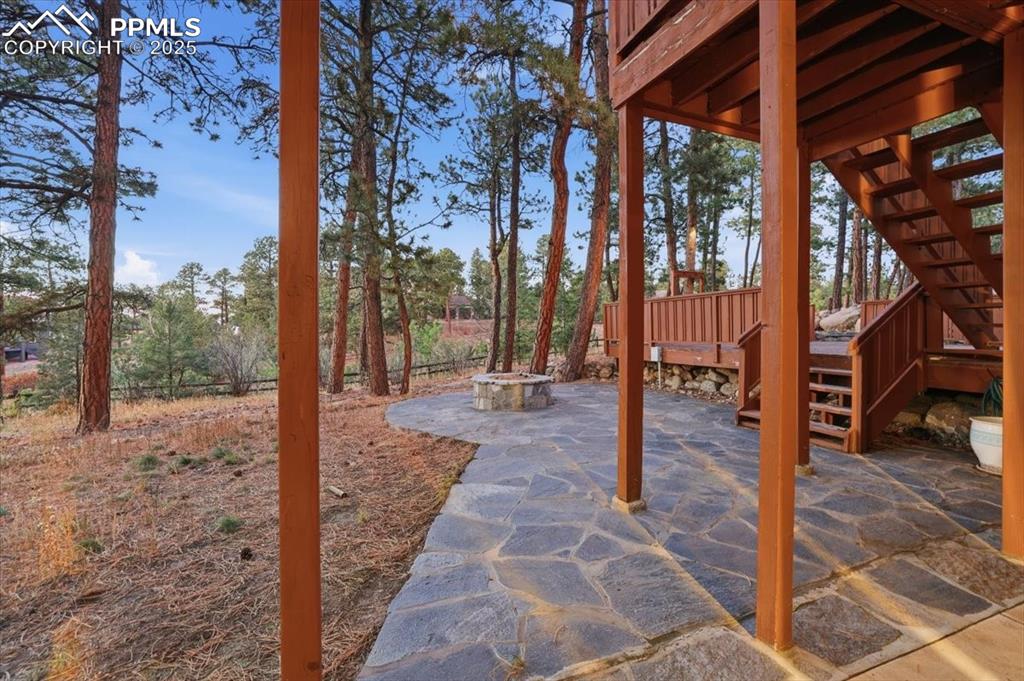 Image 41 of 49: Lower patio off of basement walkout
