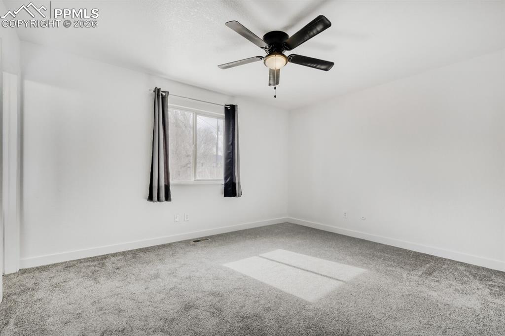 Image 19 of 36: Primary bedroom with en-suite half bathroom