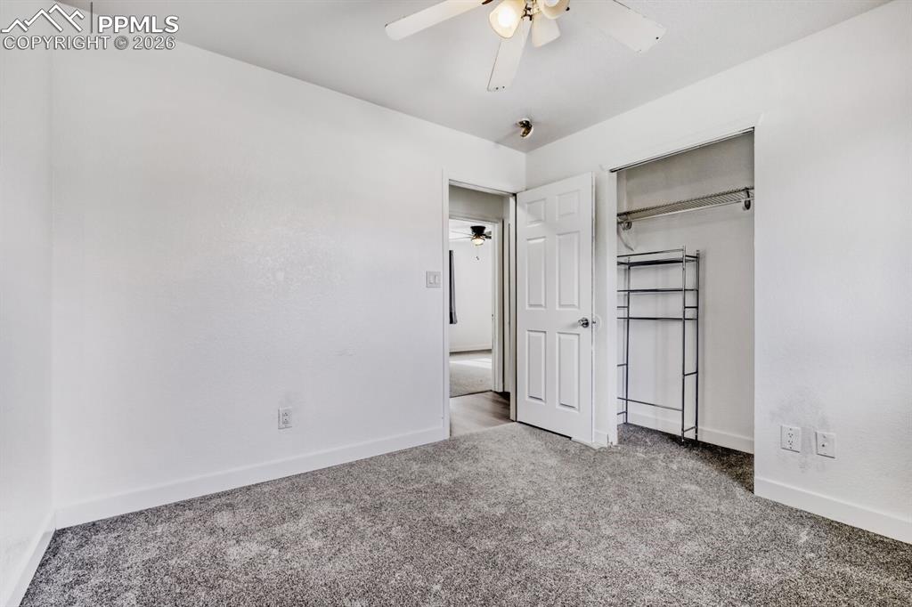 Image 20 of 36: Upstairs second bedroom