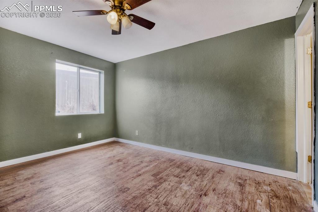 Image 27 of 36: Lower level fifth bedroom