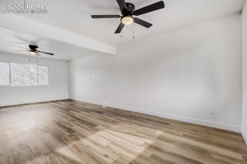 Image 9 of 36: Dining room with new ceiling fan