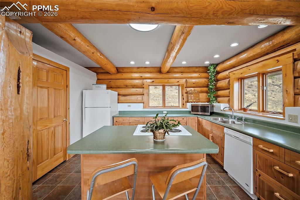 Image 8 of 28: Upper Kitchen