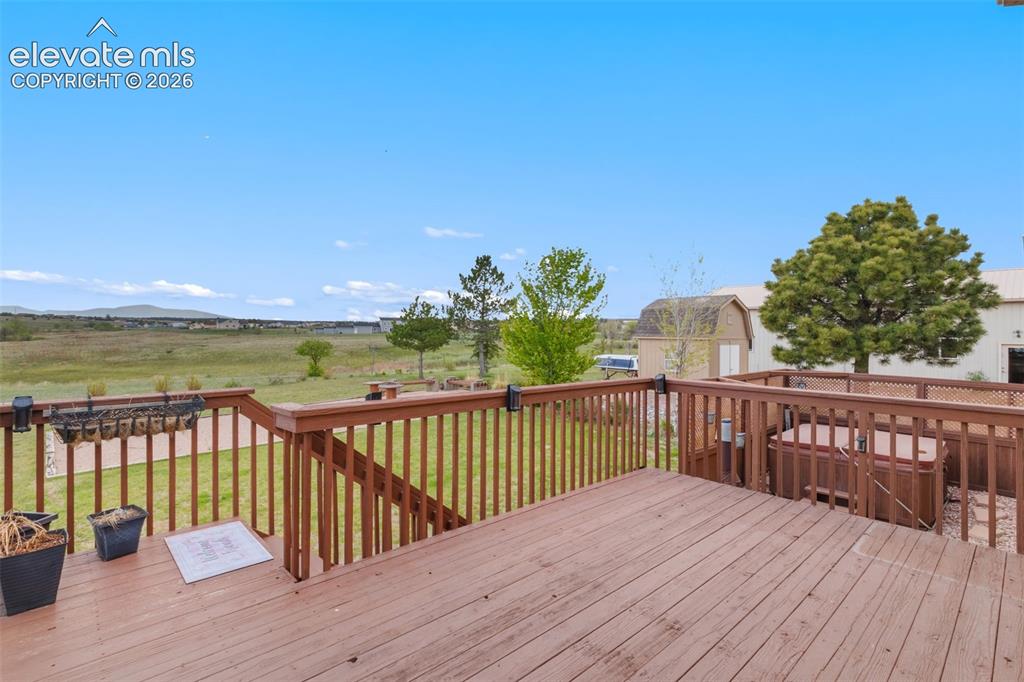 Image 14 of 49: Large deck off the main living area.