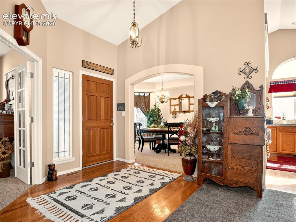 Image 15 of 49: Looking toward the entry and the formal dining area.