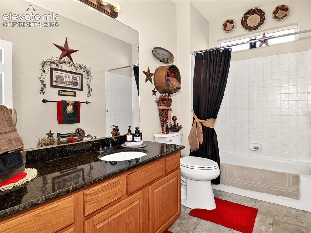 Image 27 of 49: Full bathroom on main floor.