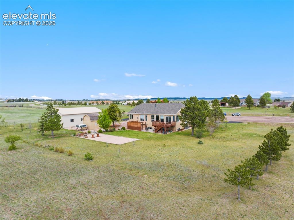 Image 45 of 49: Backside view of the property.