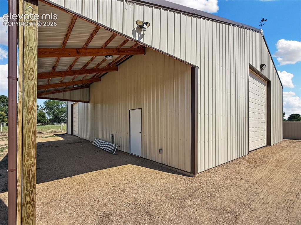 Image 47 of 48: 40x60 Barn style building with a 12