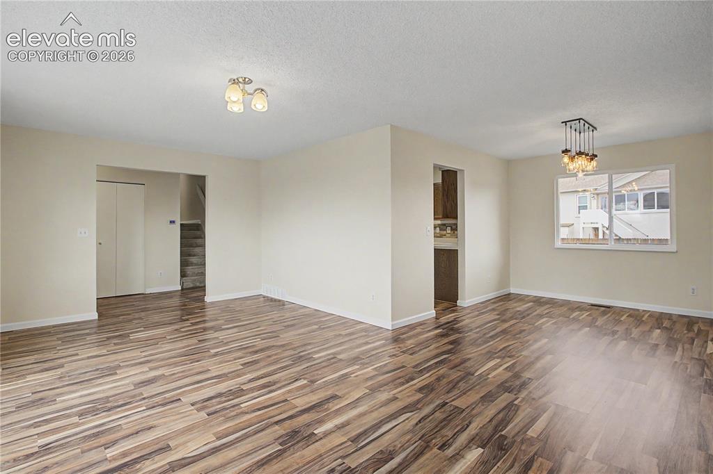 Image 5 of 37: Living Room with Formal Dining