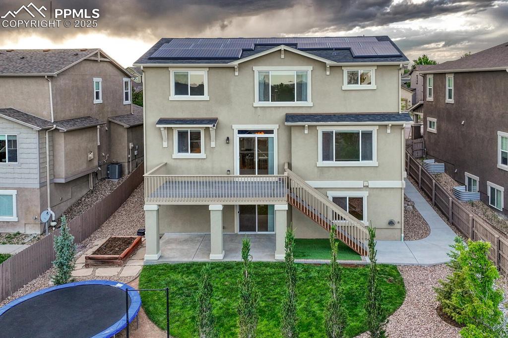 Image 3 of 50: 5 bedrooms and 5 bathrooms with walk-out basement and solar panels!