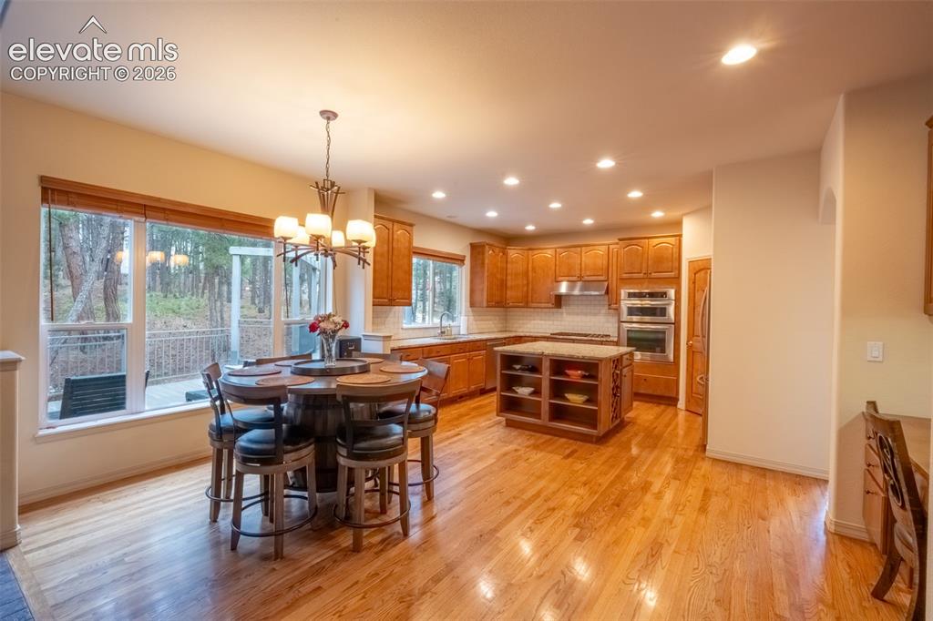 Image 10 of 49: Dining area/kitchen - main floor