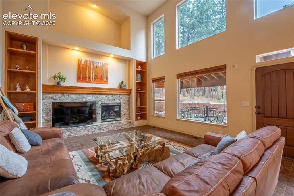 Image 13 of 49: Living room with walk out - main floor