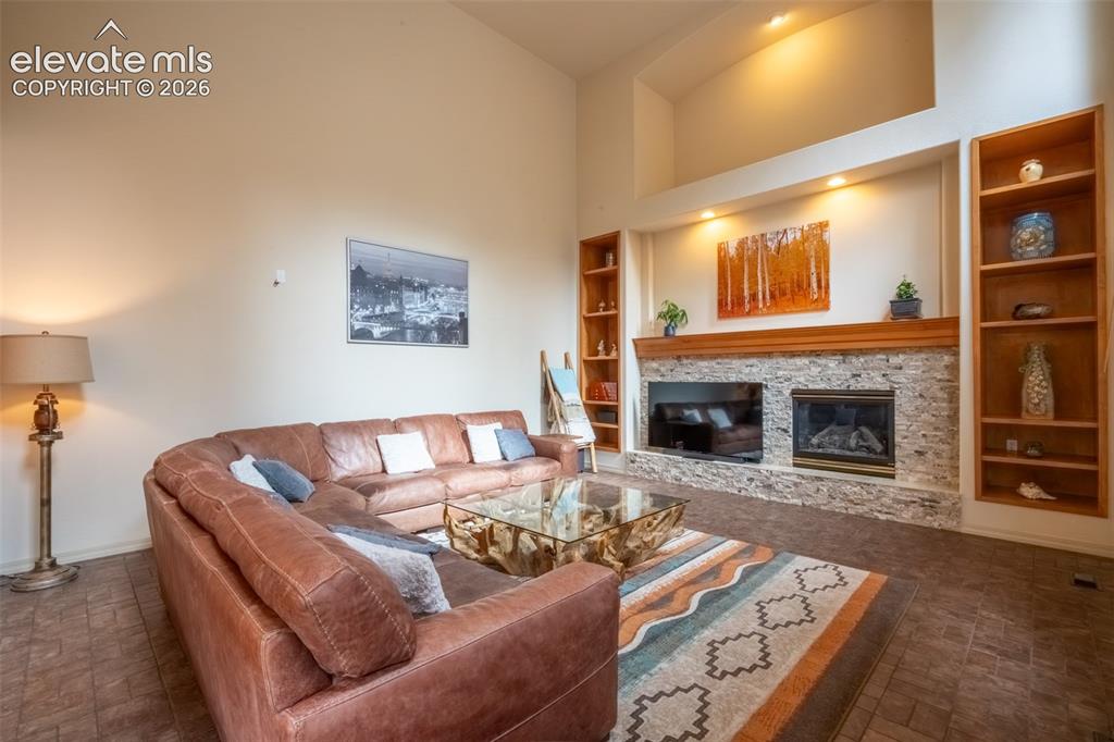 Image 14 of 49: Living room with walk out - main floor