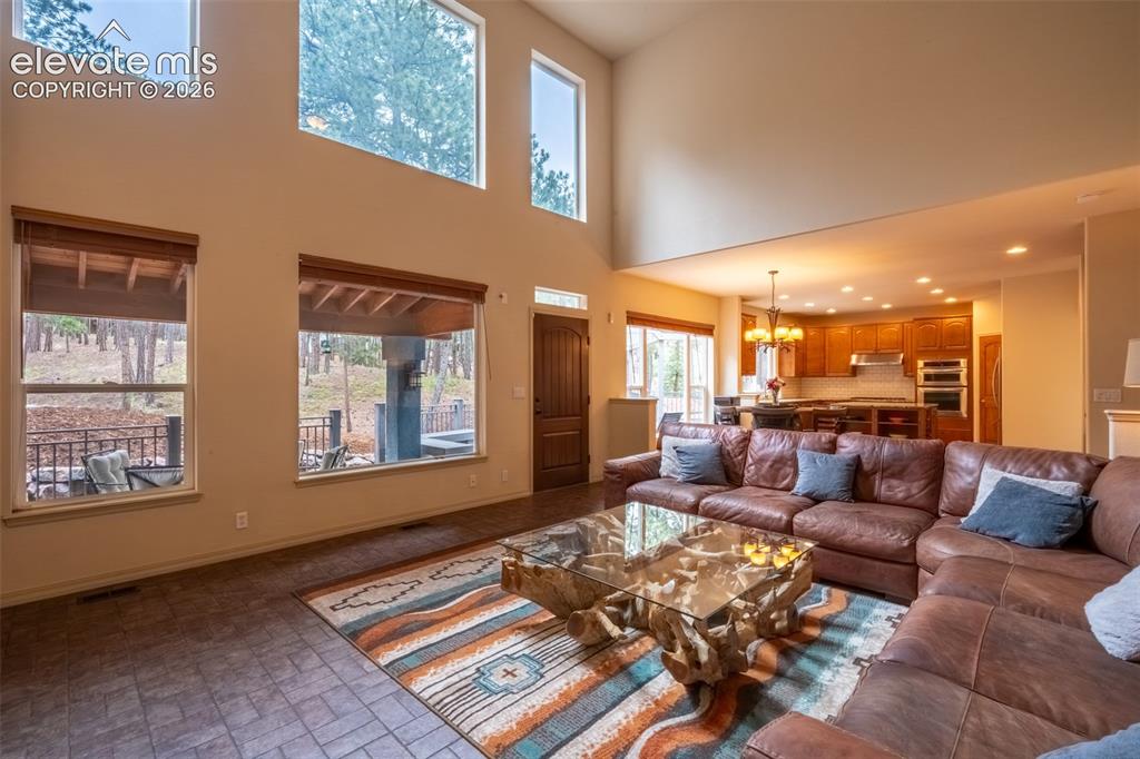 Image 16 of 49: Living room with walk out - main floor
