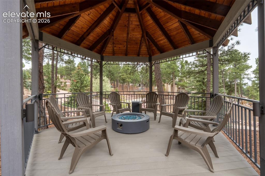 Image 3 of 49: Back yard pergola sitting area