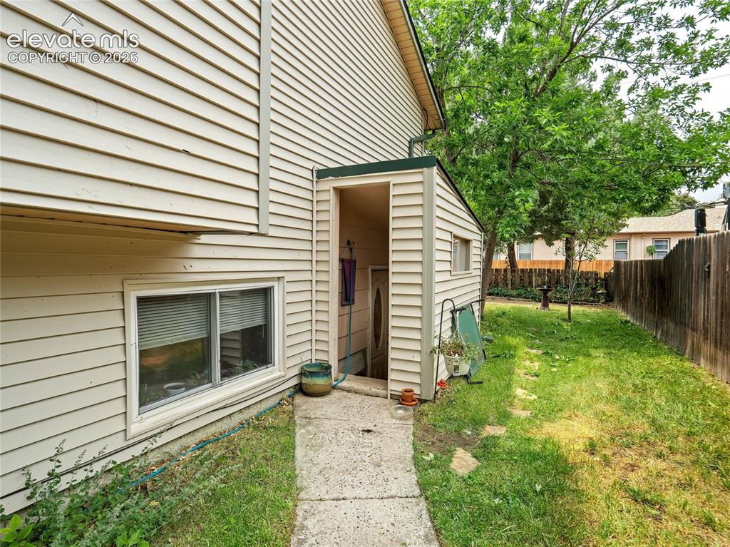 Image 30 of 33: Separate private entrance leads to the rented unit downstairs