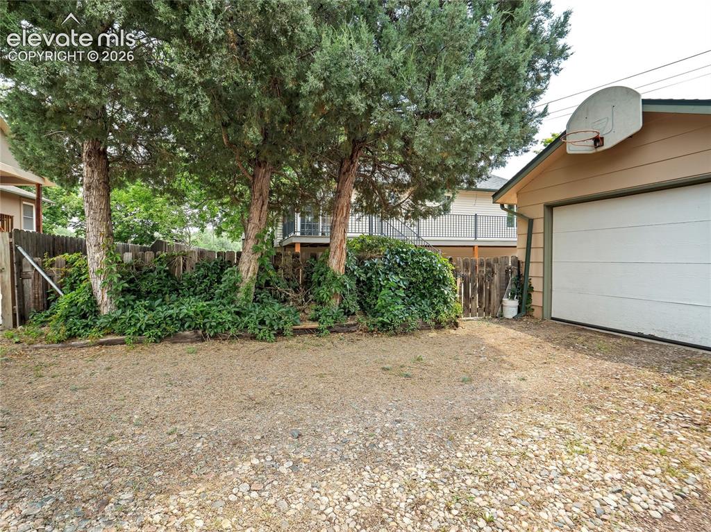Image 32 of 33: Garage is accessed through the alley and offers room for multiple vehicles
