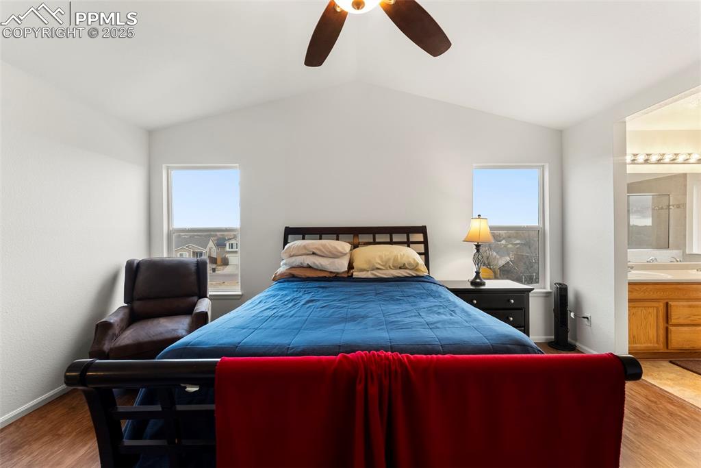 Image 11 of 28: Spacious primary bedroom with great natural light