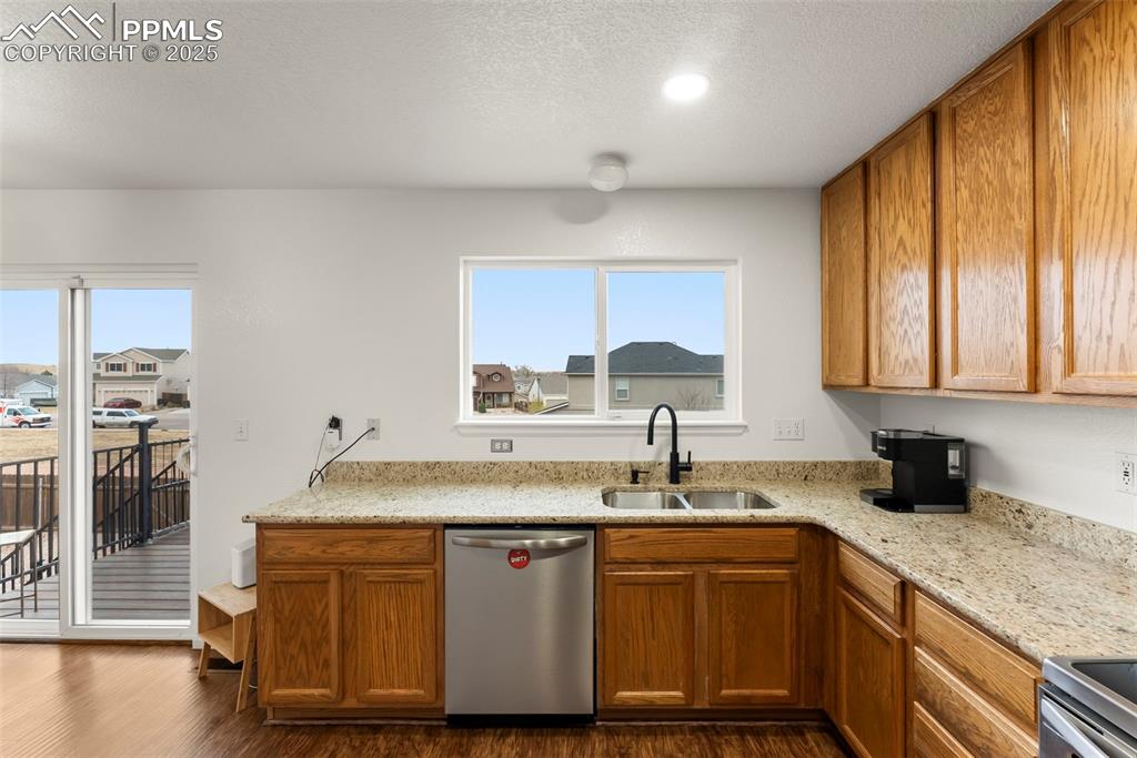 Image 8 of 28: right kitchen with backyard views and plenty of counter space
