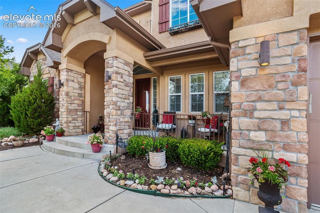 Image 2 of 41: Stone and Stucco