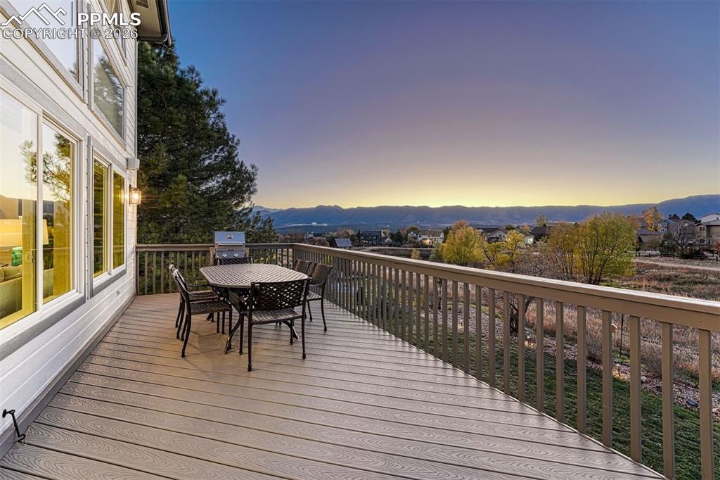 Image 8 of 41: Large deck for outdoor dining and seating