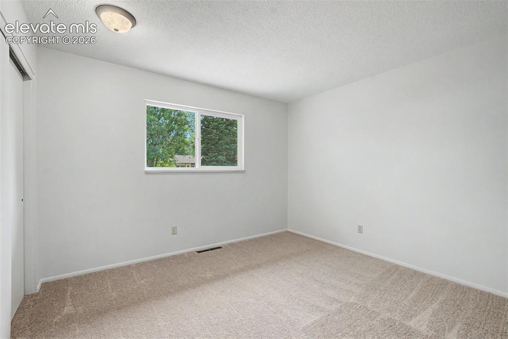 Image 22 of 37: upper bedroom