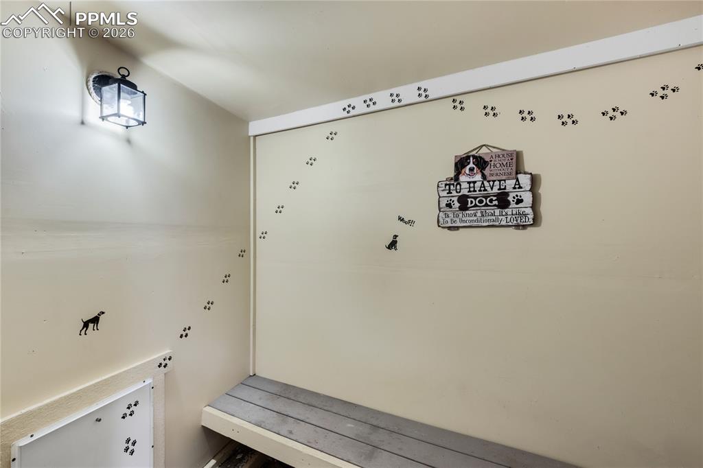 Image 17 of 46: Interior Dog Run with back yard access