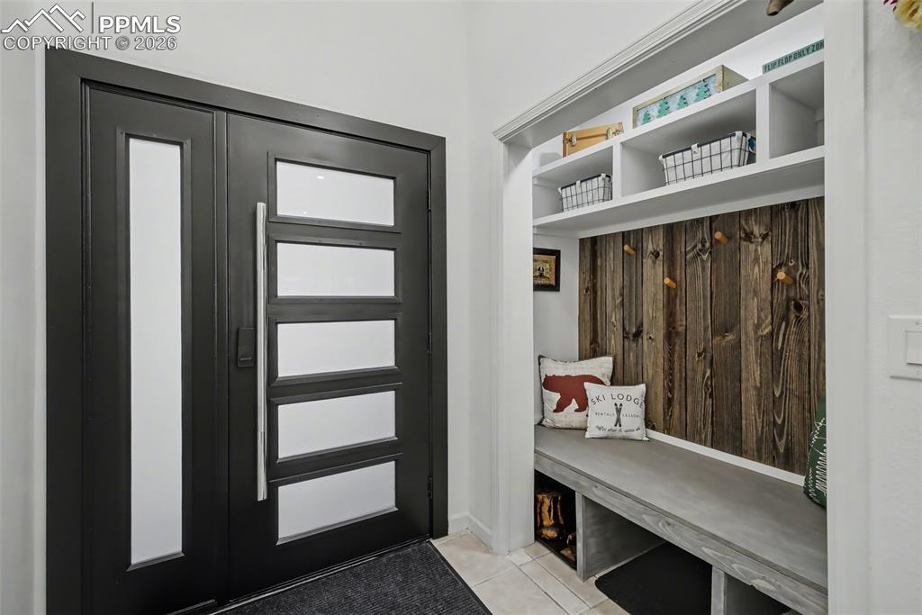 Image 4 of 36: Spacious entry beautiful storage