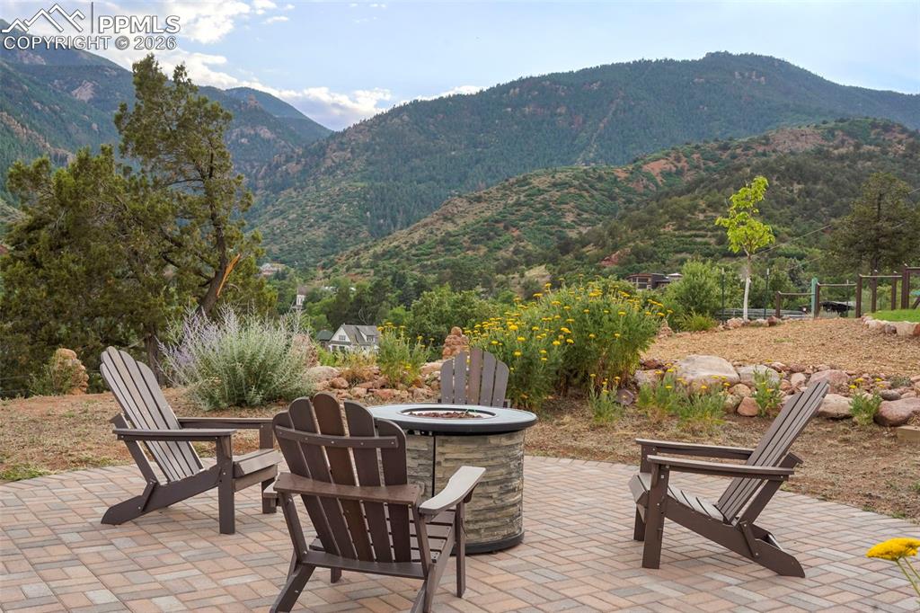 Image 7 of 47: View of patio / terrace with a mountain view