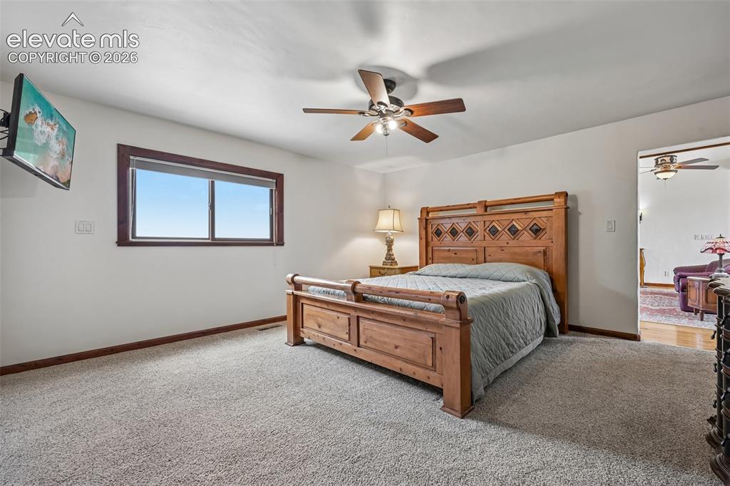 Image 17 of 36: Spacious room featuring neutral carpeting and white walls