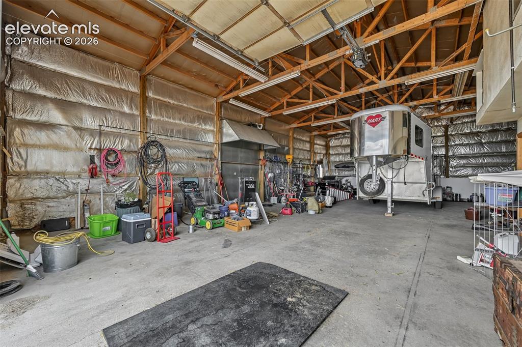 Image 26 of 36: Barn floors are concrete. This large open area was used as a commercial we