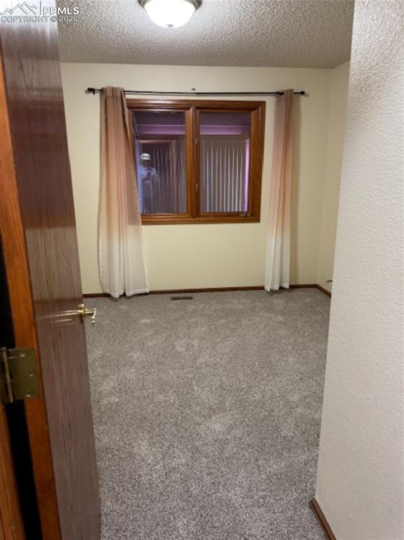 Image 25 of 30: Second Bedroom - New Carpet