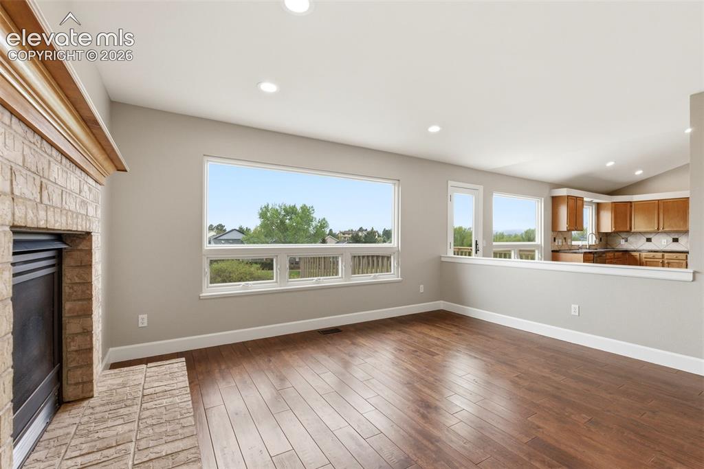 Image 30 of 50: Great room with gas fireplace