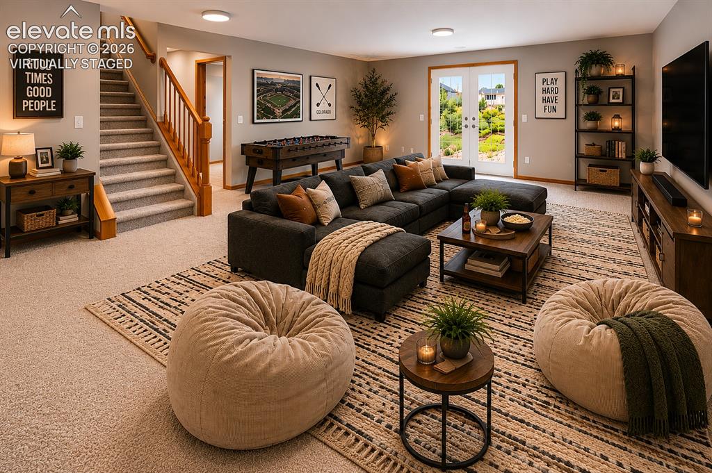 Image 41 of 50: Virtually Staged - Family Room / Rec Room with walkout to patio