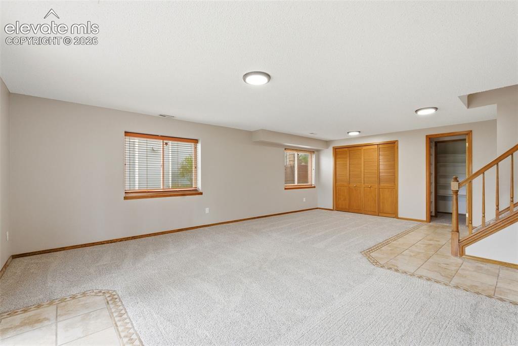 Image 43 of 50: Family Room / Rec Room with walkout to patio