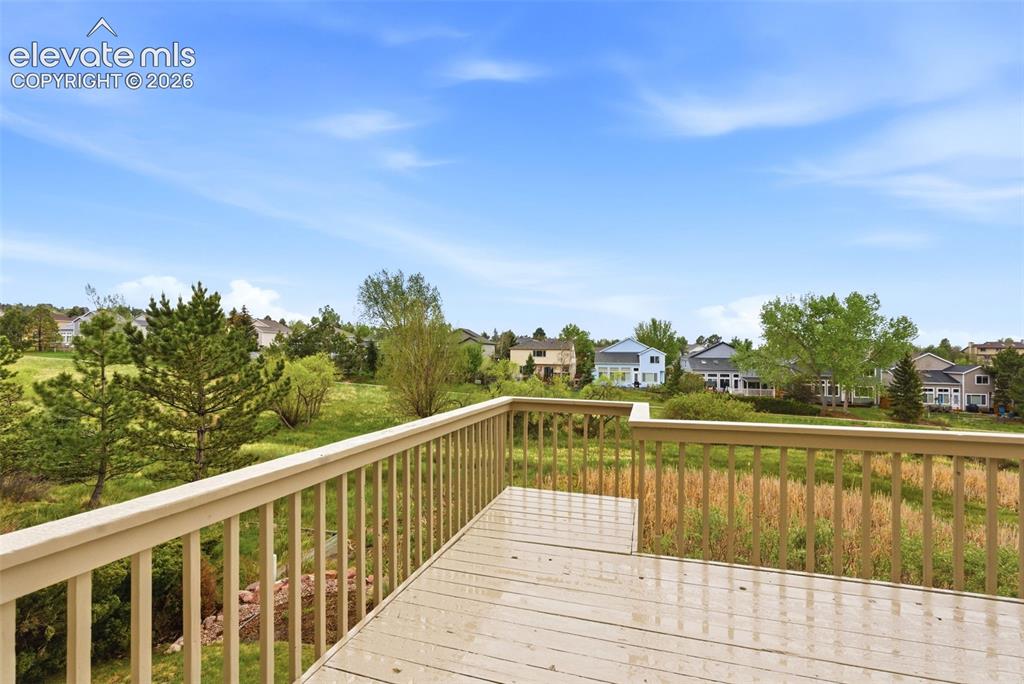Image 6 of 50: Deck with open space and massive mountain views