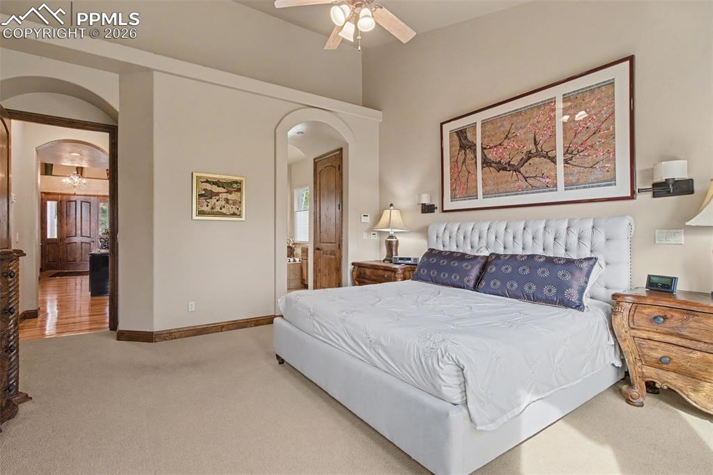 Image 17 of 42: Spacious and sophisticated, the primary bedroom boasts an adjoining walk-in