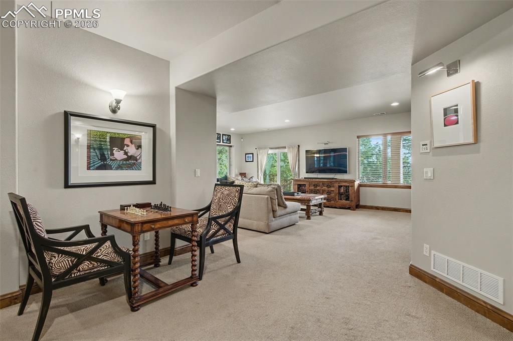 Image 23 of 42: Create a cozy game night setting or simply relax in this brilliant extensio