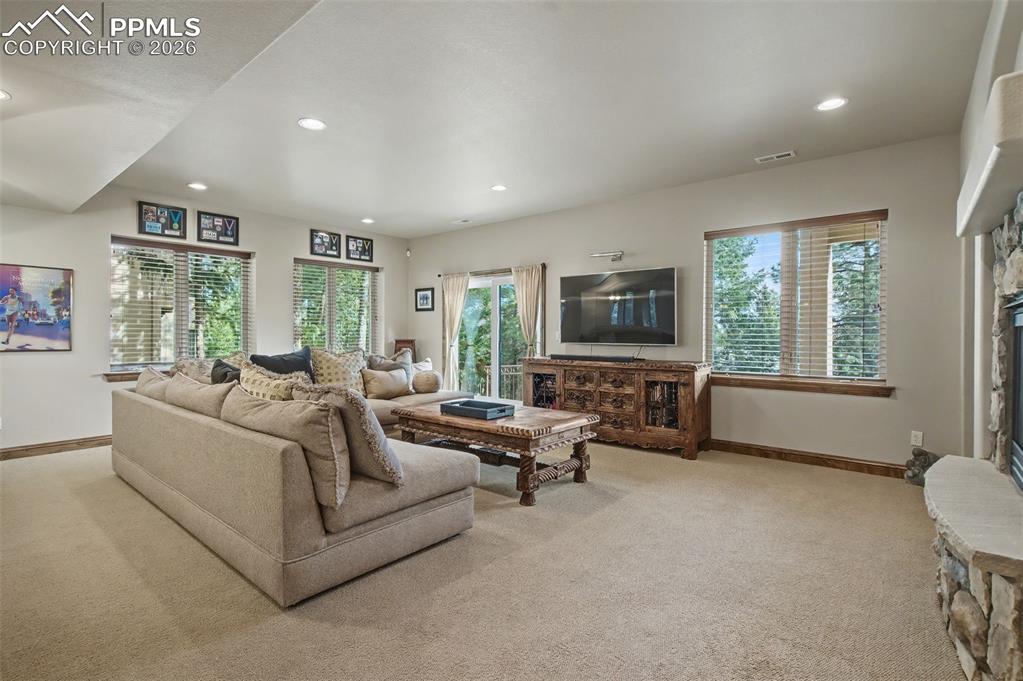 Image 24 of 42: Step right out from the family room to enjoy the fresh air and immerse your