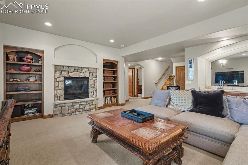 Image 27 of 42: Enjoy the open layout of this basement level space after a long day of hiki