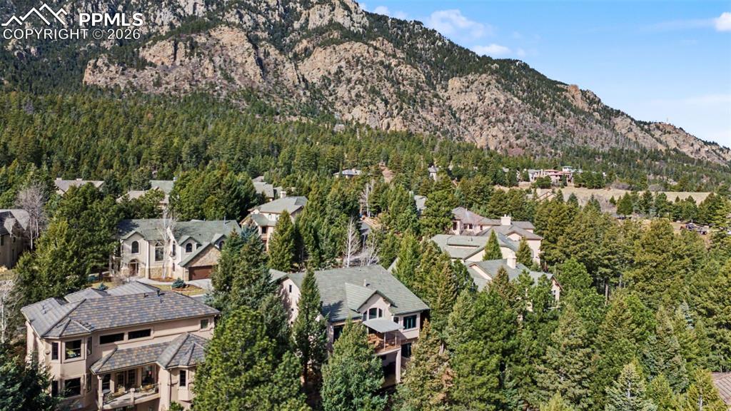 Image 41 of 42: Surrounded by towering trees, this property offers the ultimate peaceful ge