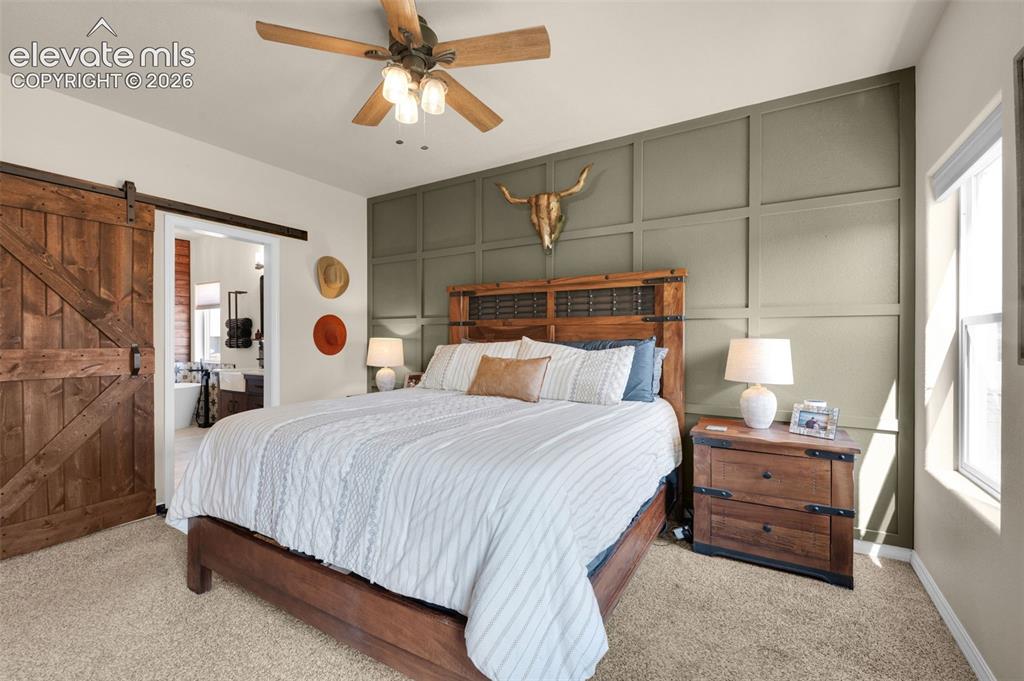 Image 13 of 50: Special Features Include Accent Wall And Barn Door
