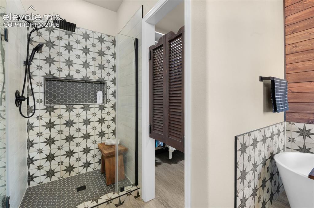 Image 15 of 50: Designer Tile And Frameless Shower Glass