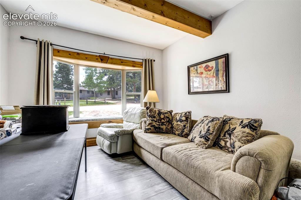 Image 21 of 41: Family room has a bay window