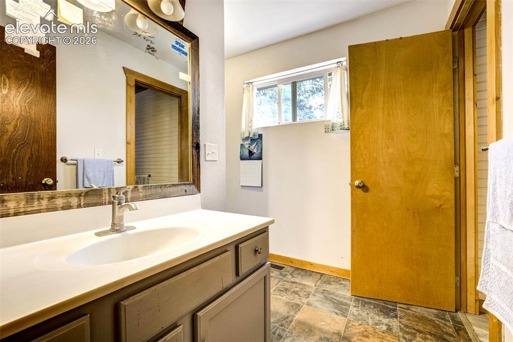 Image 31 of 41: Main level bathroom