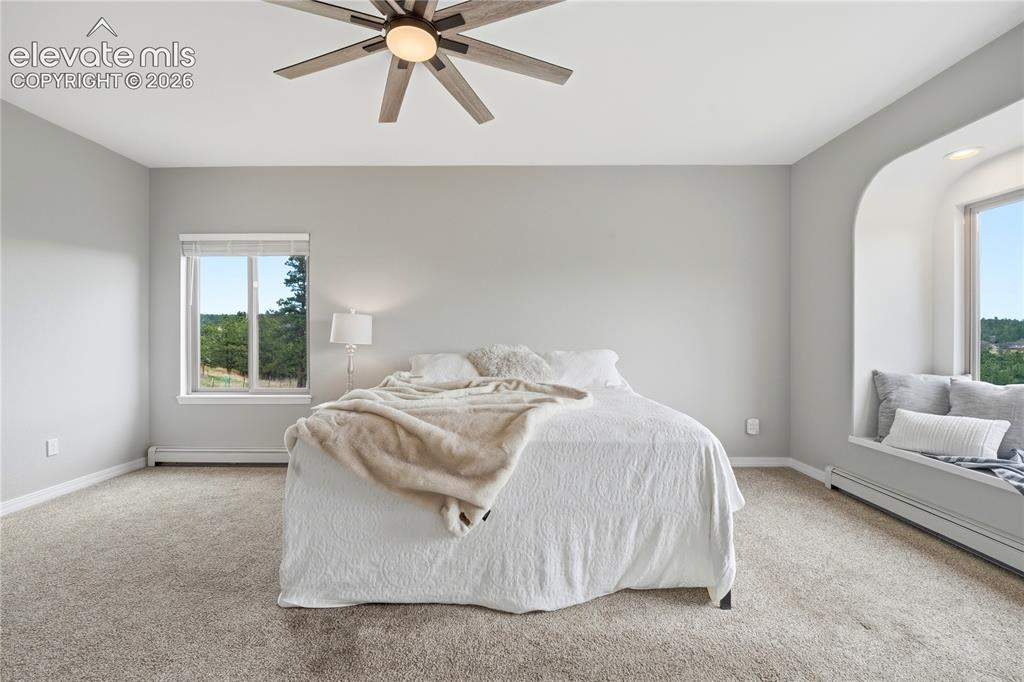Image 16 of 50: Master Bedroom