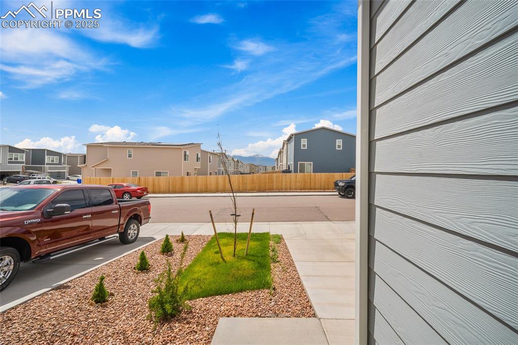 Image 3 of 41: View of yard with a residential view