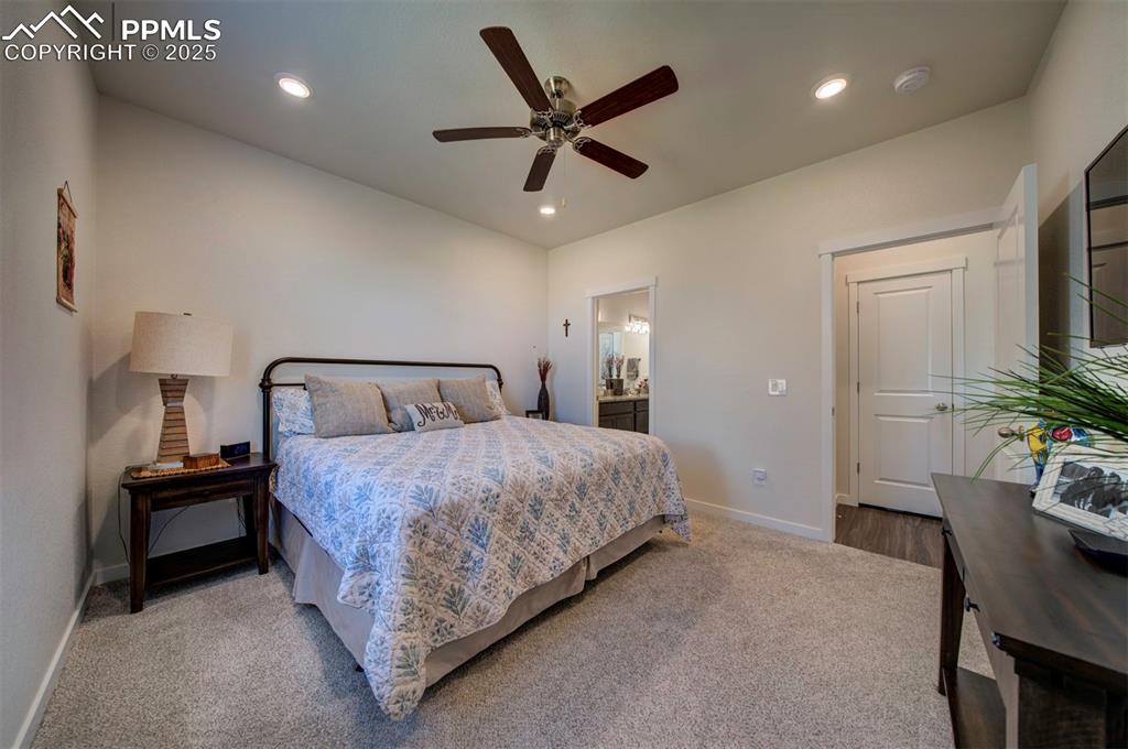 Image 15 of 42: Bedroom featuring baseboards, carpet floors, recessed lighting, connected b