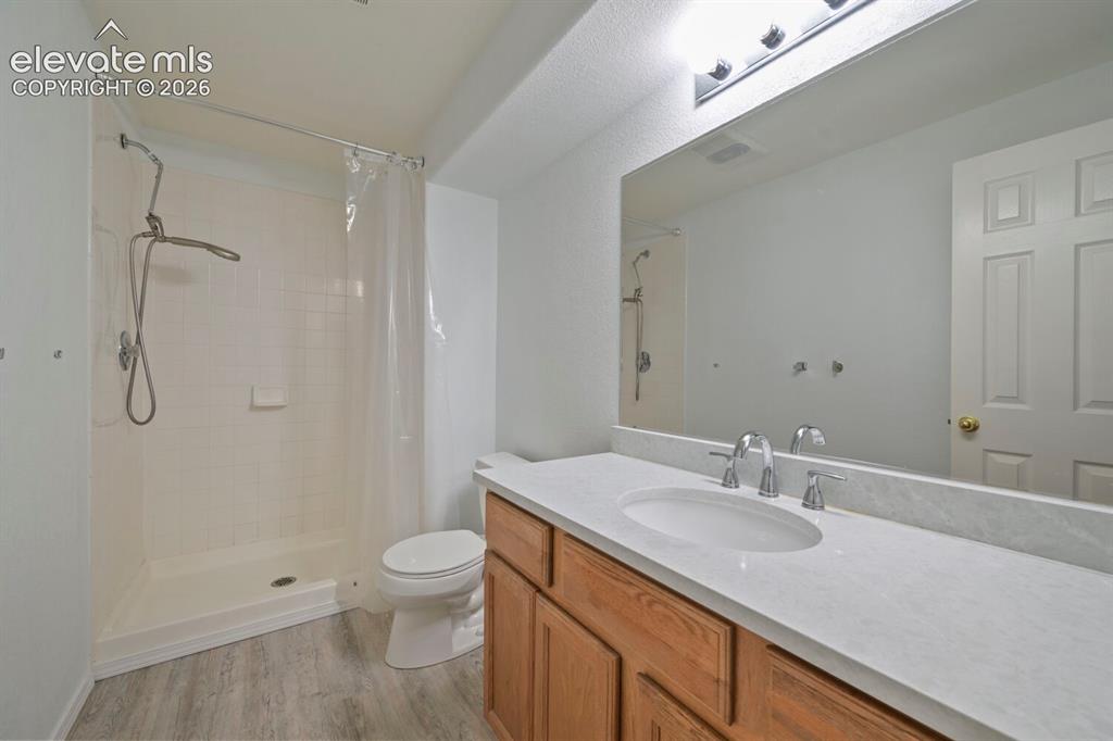 Image 36 of 47: Down stair community bath with shower.