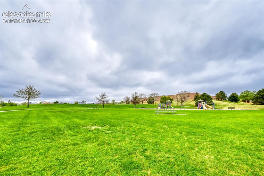 Image 40 of 47: Beautiful Fred Mckown Park with swings, large open space and walking track.